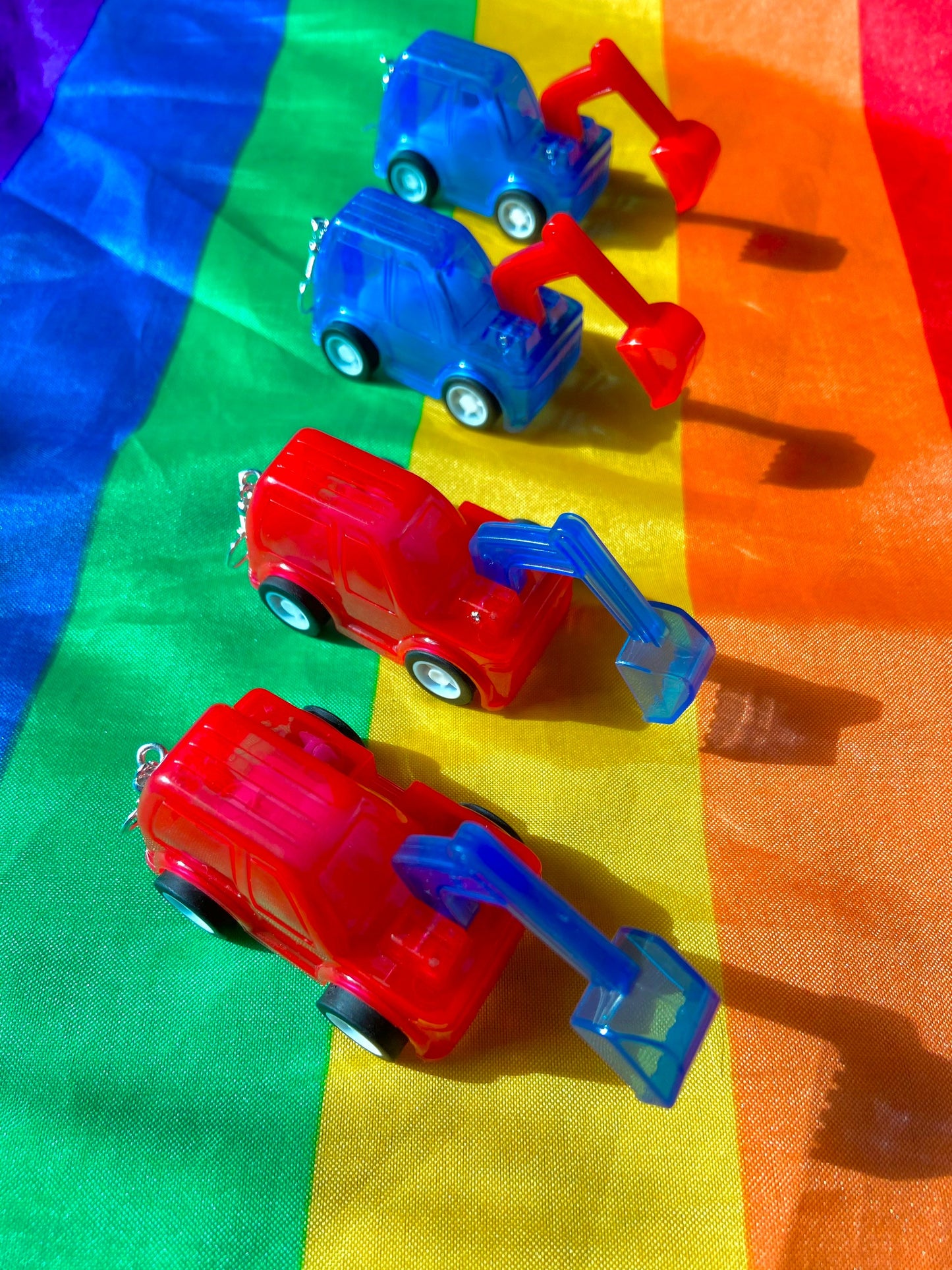 Cute tractor w adjustable shovel pullback stim toy earrings