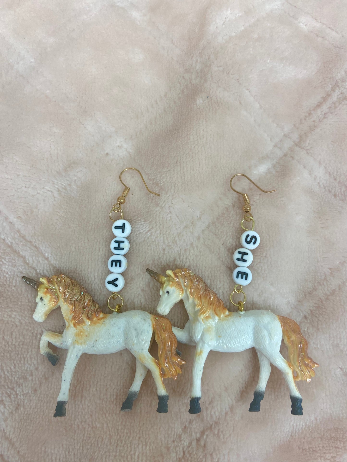 She/they critter pronoun earrings