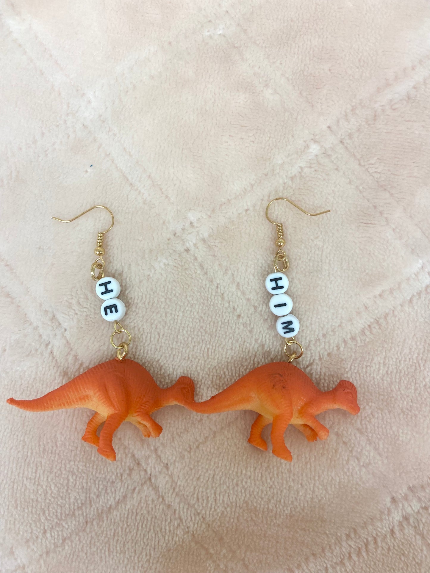 He/him critter pronoun earrings