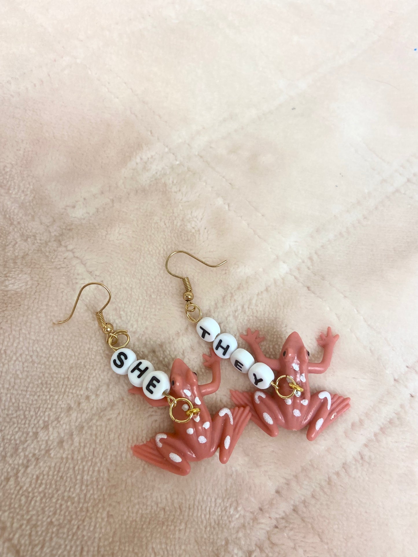 She/they critter pronoun earrings