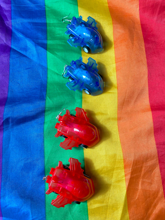 Still toy airplane pull back earrings